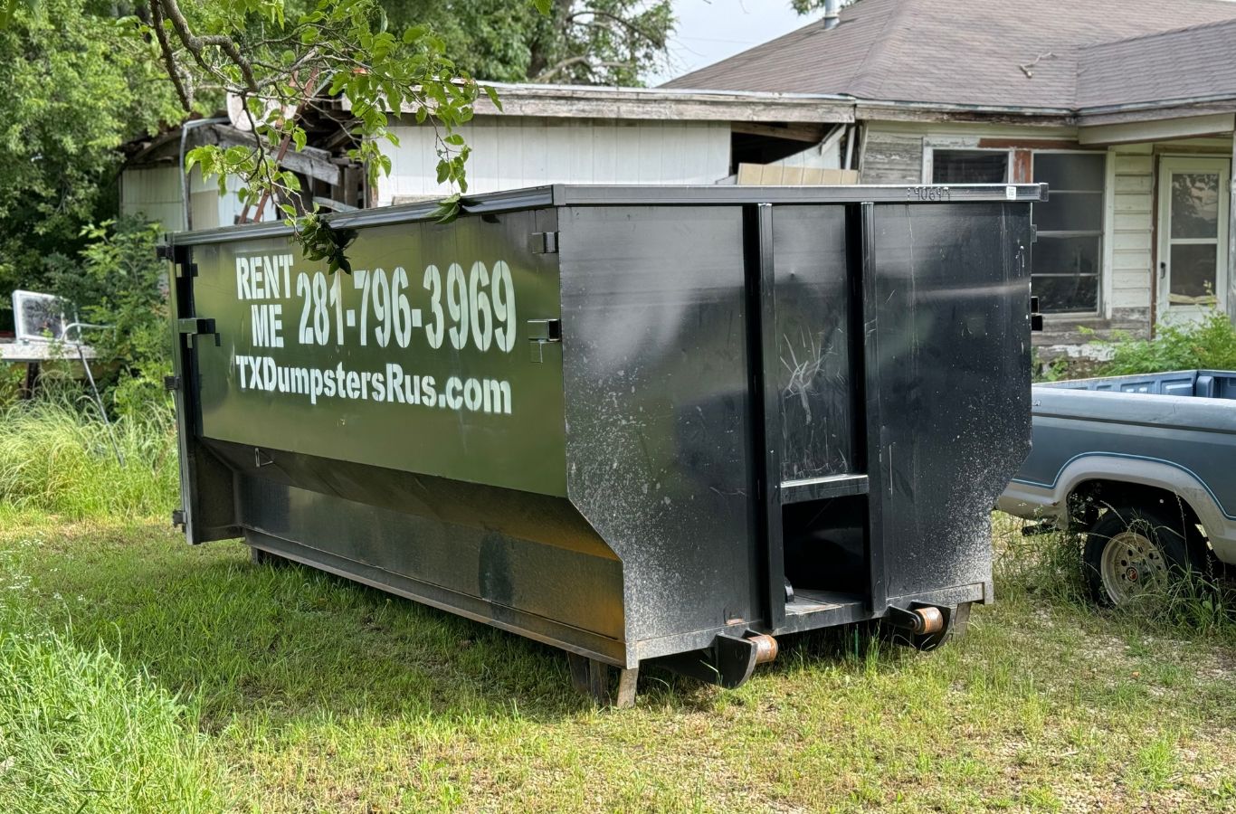 Why choose commercial dumpster rental in Wilmer, TX by TX Dumpsters R Us, showing a worker managing waste disposal. Commercial Dumpster Rental near me.